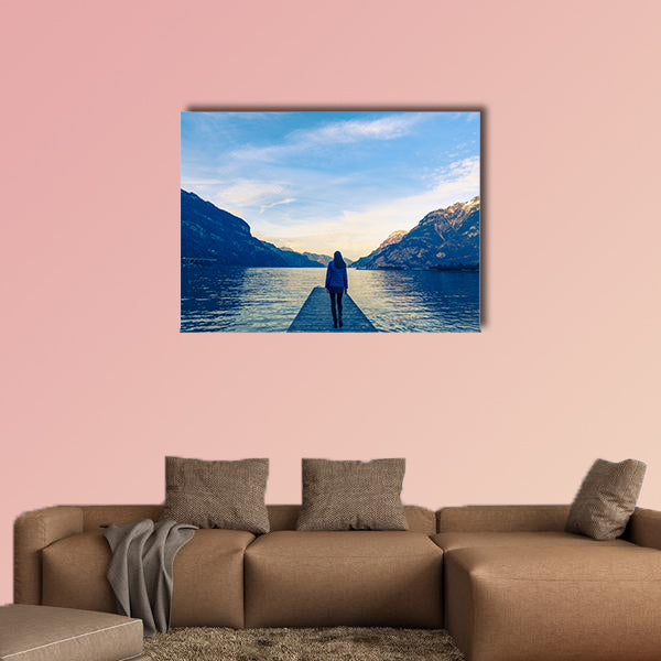 Woman goes on a wooden pier multi panel canvas wall art