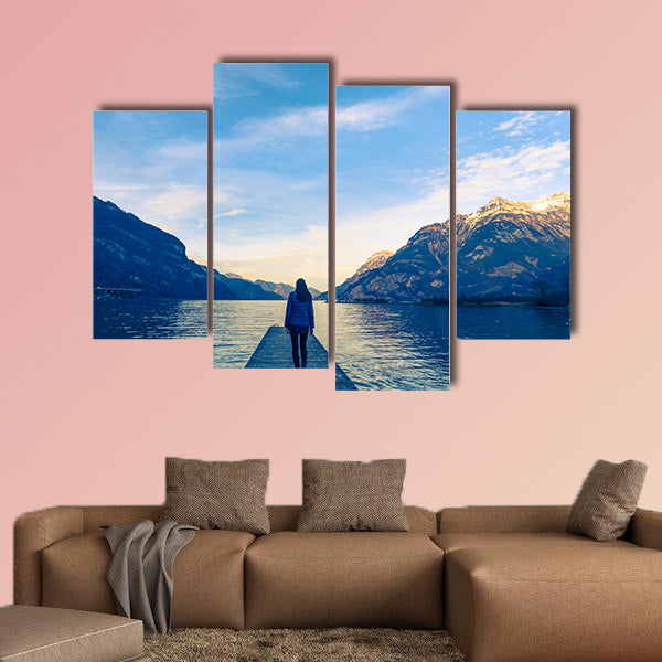 Woman goes on a wooden pier multi panel canvas wall art