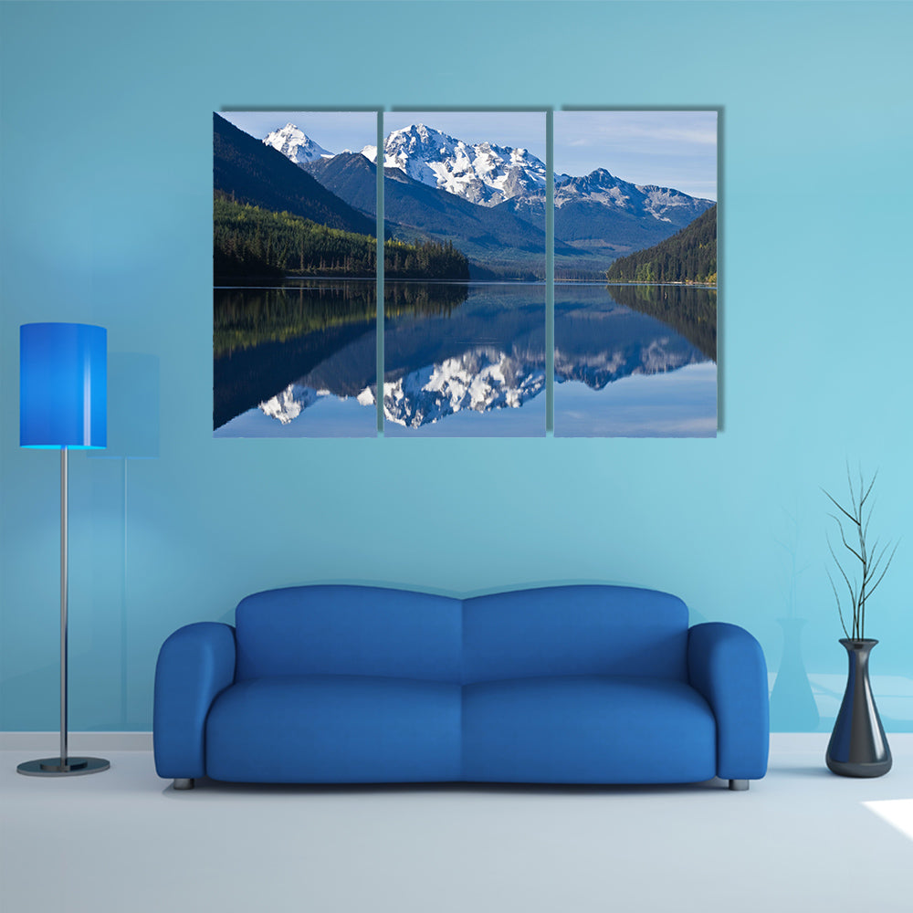 The mountain Range in British Columbia reflecting on a lake multi panel canvas wall art