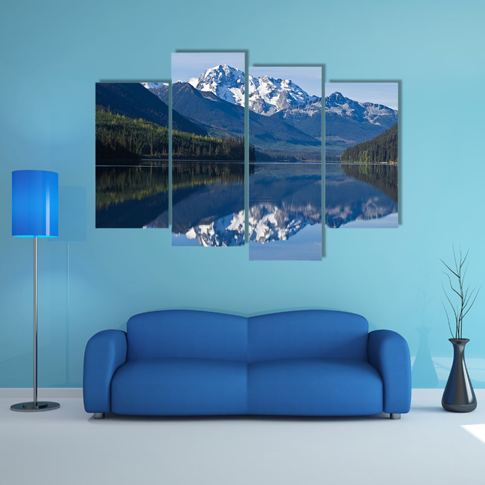 The mountain Range in British Columbia reflecting on a lake multi panel canvas wall art