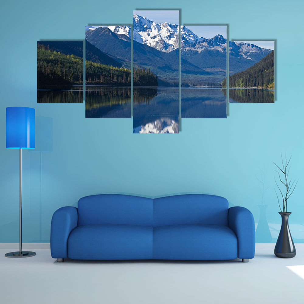 The mountain Range in British Columbia reflecting on a lake multi panel canvas wall art