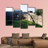  View of steps, wall and gate from inside of fort multi panel canvas wall art