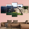  View of steps, wall and gate from inside of fort multi panel canvas wall art