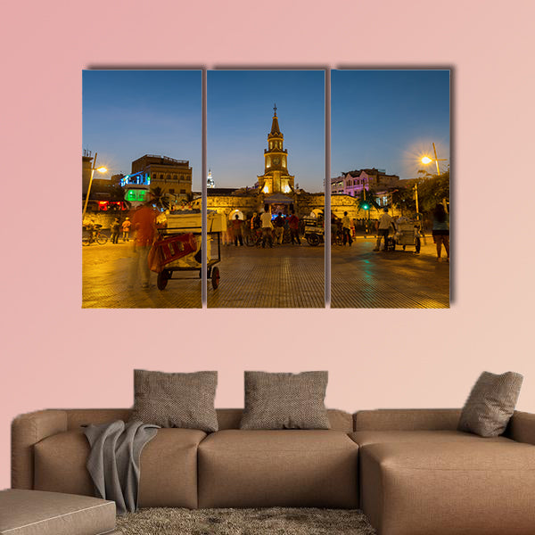 A crowd gathers to watch a Champeta in Cartagena, Colombia multi panel canvas wall art