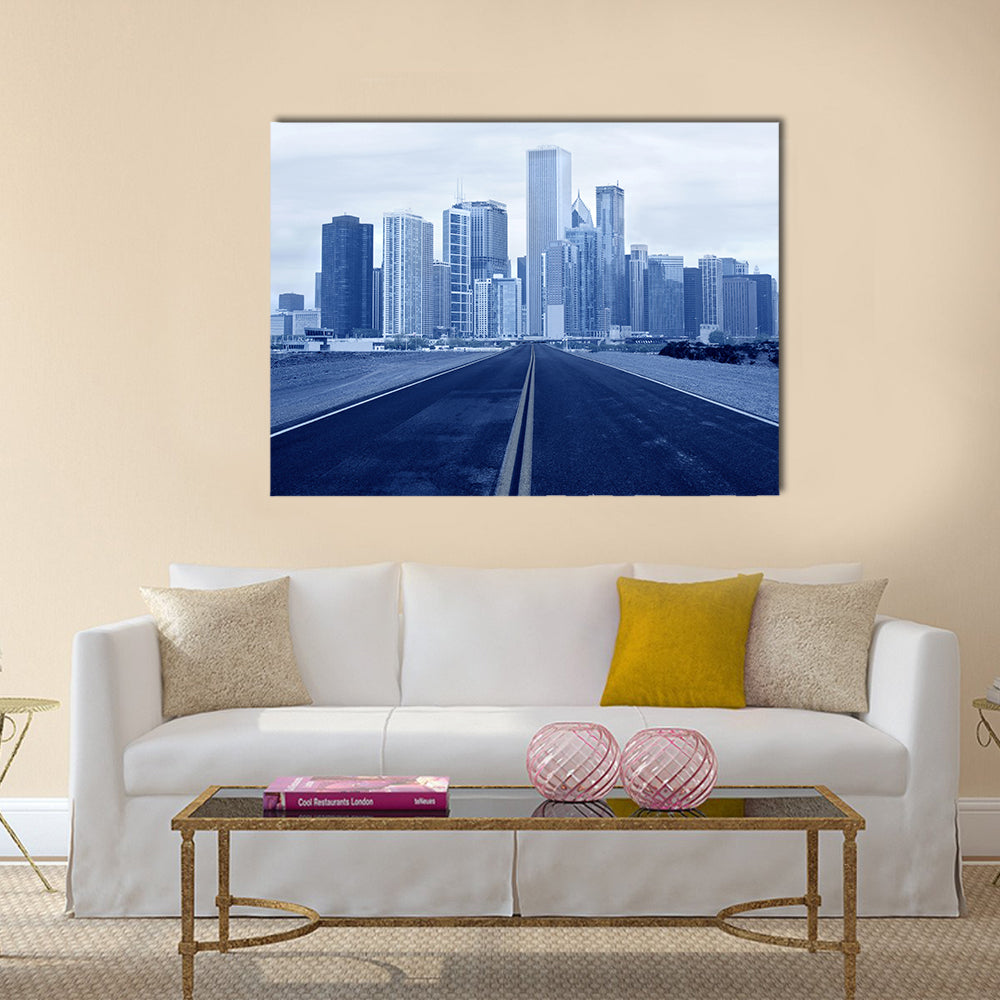 Road leading to a city multi panel canvas wall art