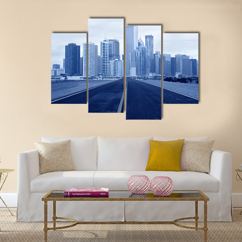 Road leading to a city multi panel canvas wall art