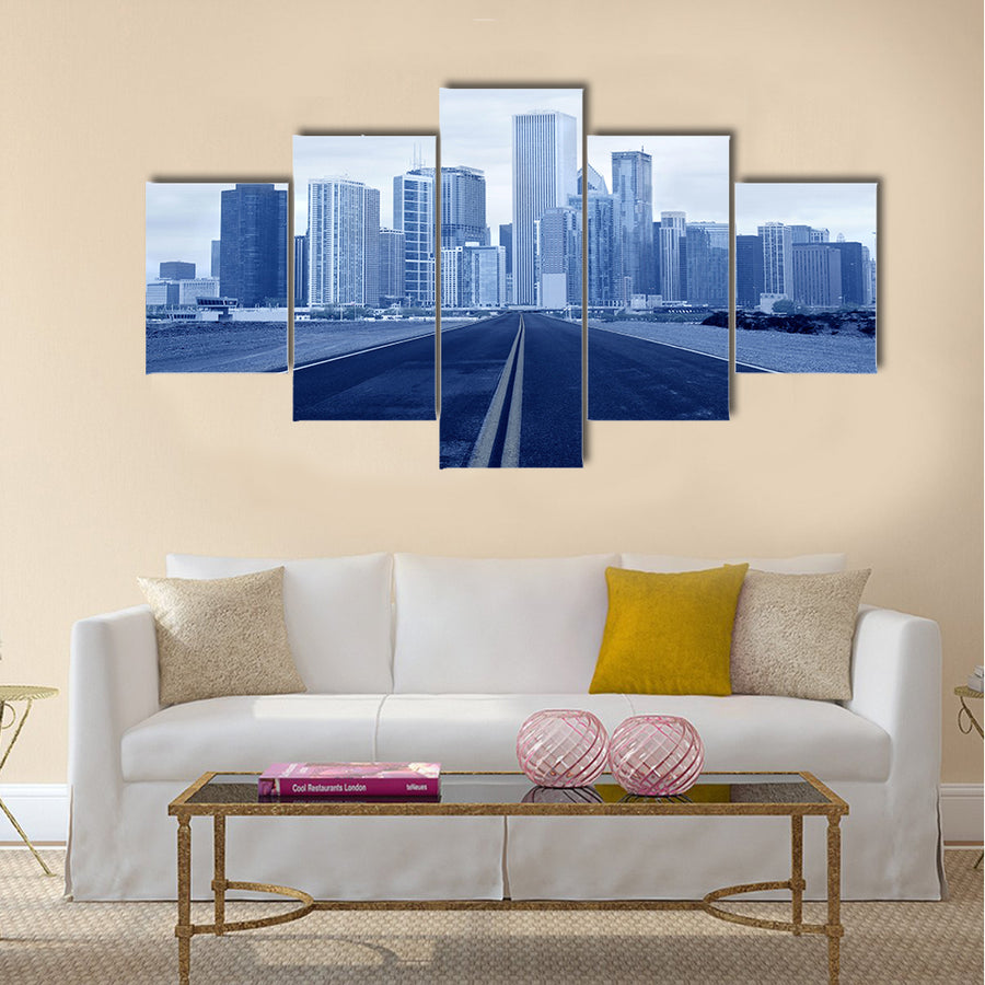 Road leading to a city multi panel canvas wall art