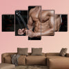 Young man train in the gym healthcare lifestyle sexy caucasian man bodybuilder wall art