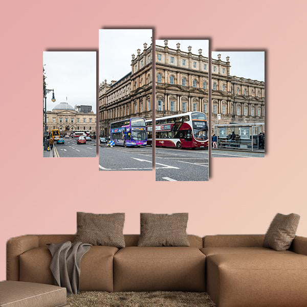 People are walking on the North Bridge in Edinburgh multi panel canvas wall art