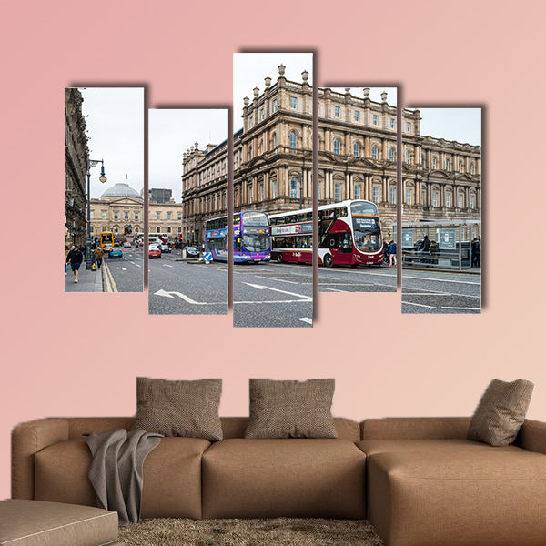 People are walking on the North Bridge in Edinburgh multi panel canvas wall art