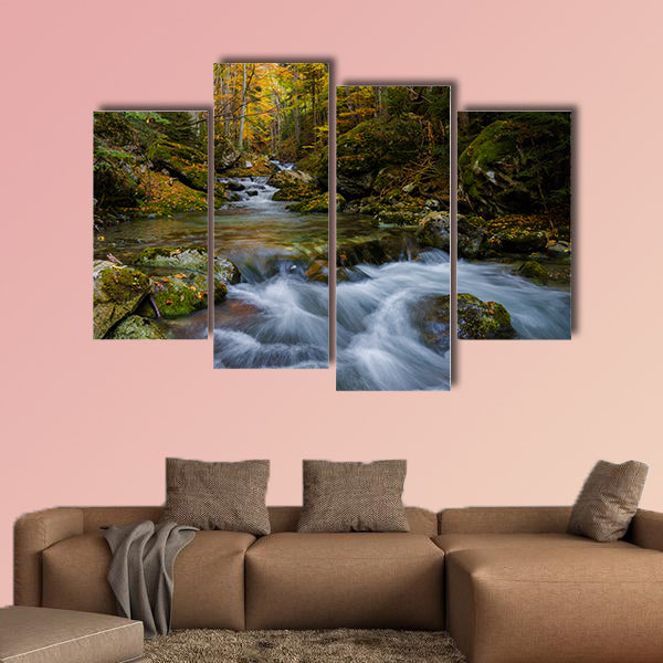 Magically colorful autumn in a wild old forest park with a pure stream cascading down the mountain Multi panel canvas wall art