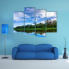 Beautiful landscape and reflection in a river in the Amazon Rain Forest near Iquitos, Peru Multi Panel Canvas Wall Art