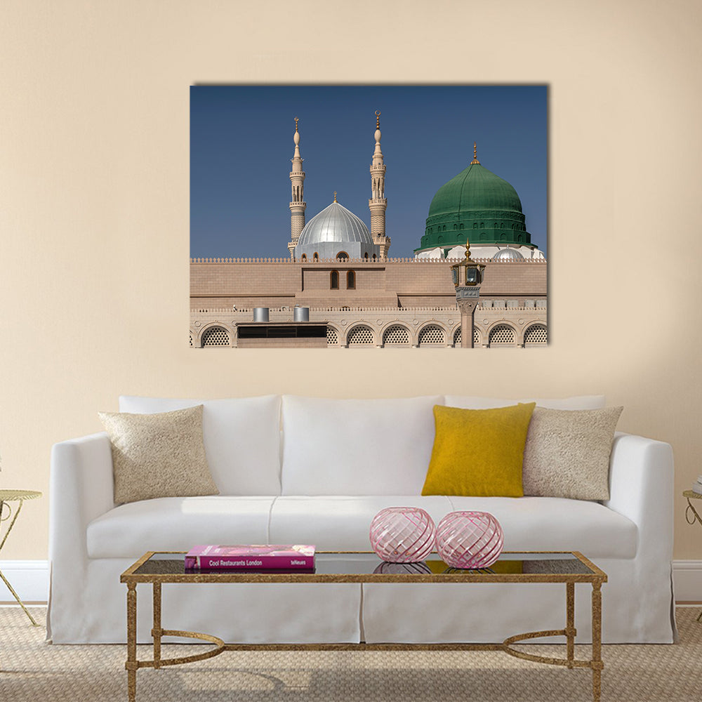 Exterior view of minarets and green dome of a mosque multi panel canvas wall art