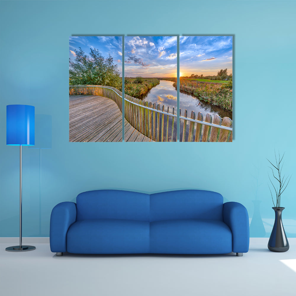 The Vivid Sunset Over Wooden Balustrade Balcony On Bridge In Water, Netherlands  Multi Panel Canvas Wall Art