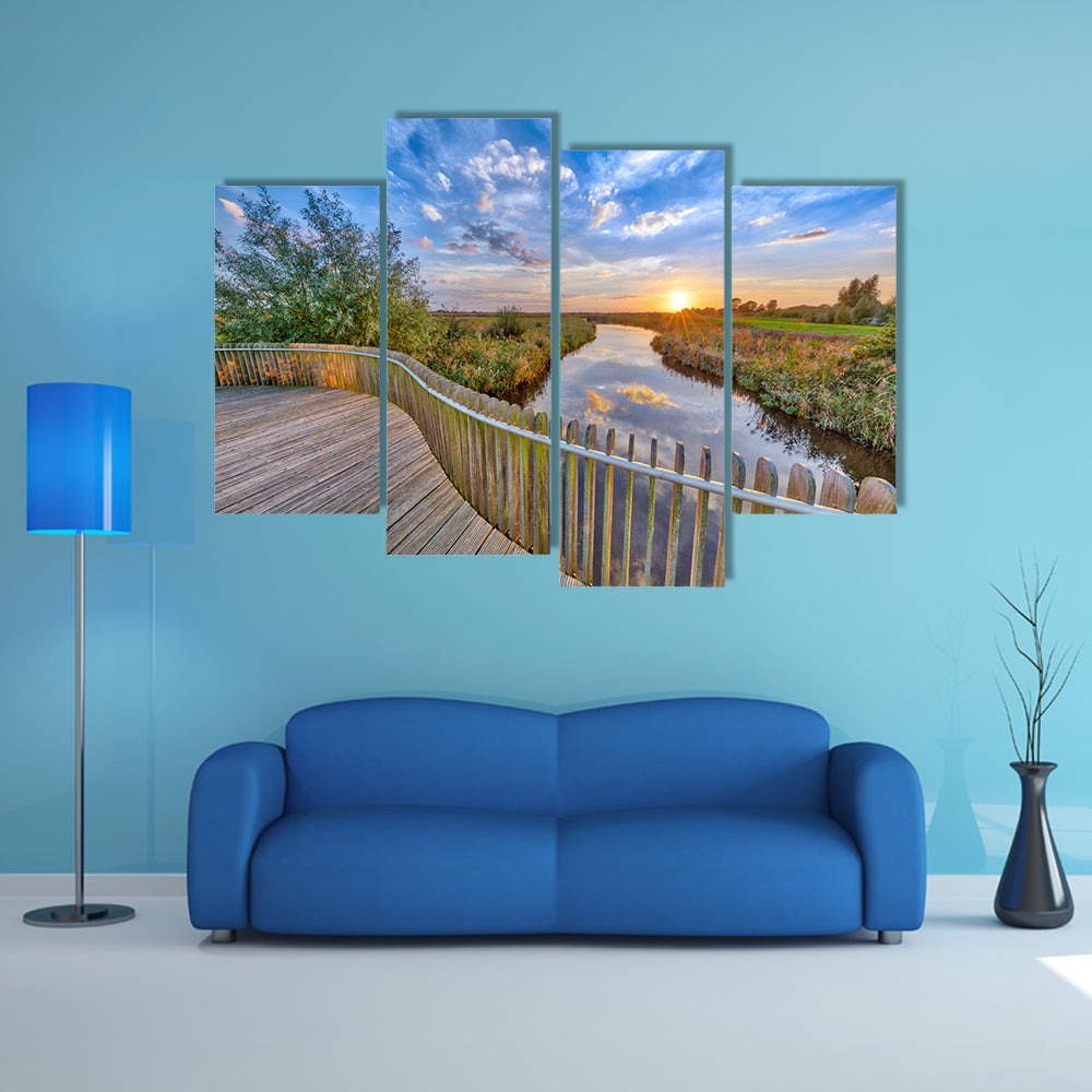 The Vivid Sunset Over Wooden Balustrade Balcony On Bridge In Water, Netherlands  Multi Panel Canvas Wall Art
