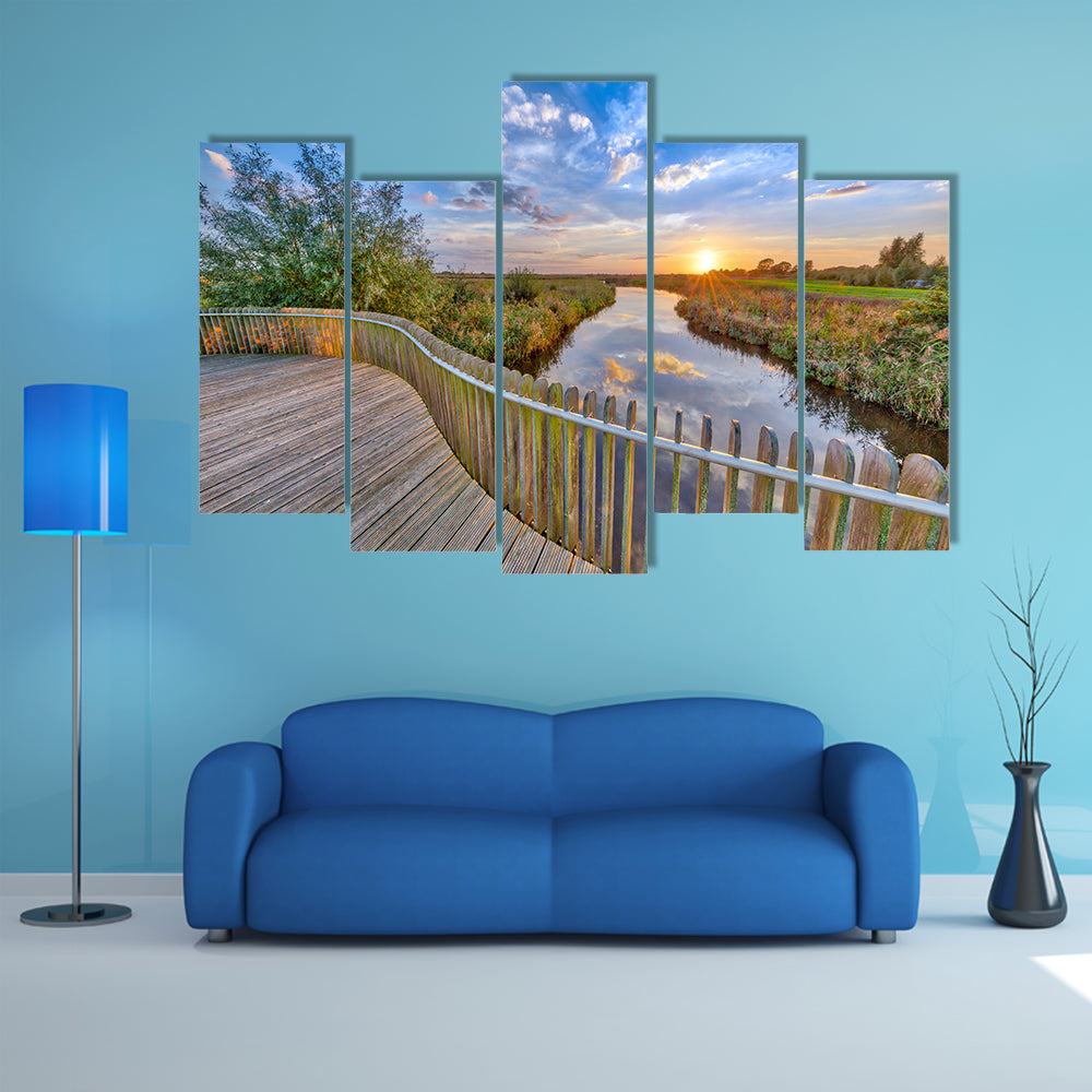 The Vivid Sunset Over Wooden Balustrade Balcony On Bridge In Water, Netherlands  Multi Panel Canvas Wall Art