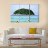 Island near the beach in the ocean Multi Panel Canvas Wall Art