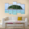 Island near the beach in the ocean Multi Panel Canvas Wall Art