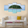 Island near the beach in the ocean Multi Panel Canvas Wall Art