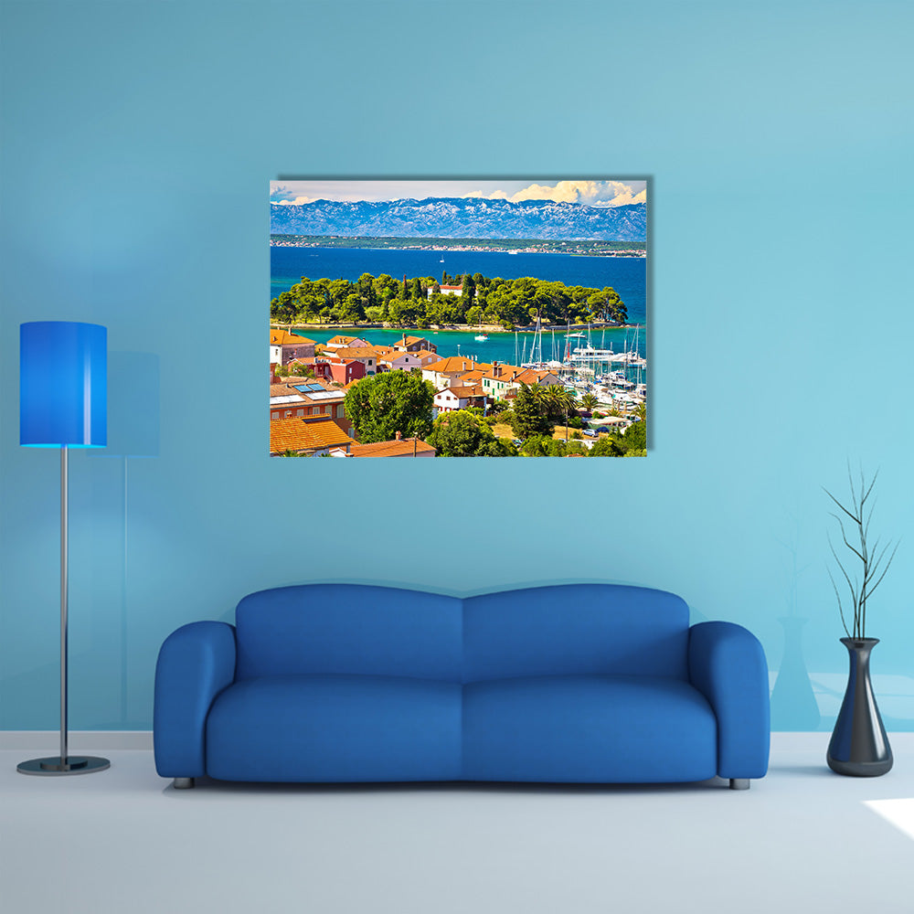 A Waterfront View With Mountains And Greenery Around Multi Panel Canvas Wall Art