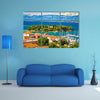 A Waterfront View With Mountains And Greenery Around Multi Panel Canvas Wall Art