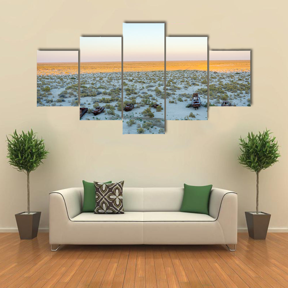 Old ships in the desert ship cemetery the consequence of Aral sea disaster Muynak Uzbekistan Multi panel canvas wall art