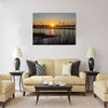 Spring sunset on the river, the sun in the reeds Multi panel canvas wall art