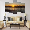 Spring sunset on the river, the sun in the reeds Multi panel canvas wall art