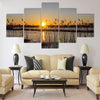 Spring sunset on the river, the sun in the reeds Multi panel canvas wall art