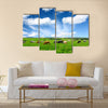 Cows on green meadow Multi panel canvas wall art