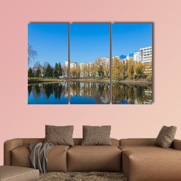Beautiful Park in the center of the city in sunny weather in early spring multi panel canvas wall art