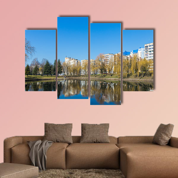 Beautiful Park in the center of the city in sunny weather in early spring multi panel canvas wall art