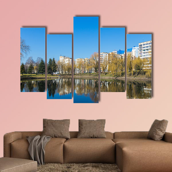 Beautiful Park in the center of the city in sunny weather in early spring multi panel canvas wall art
