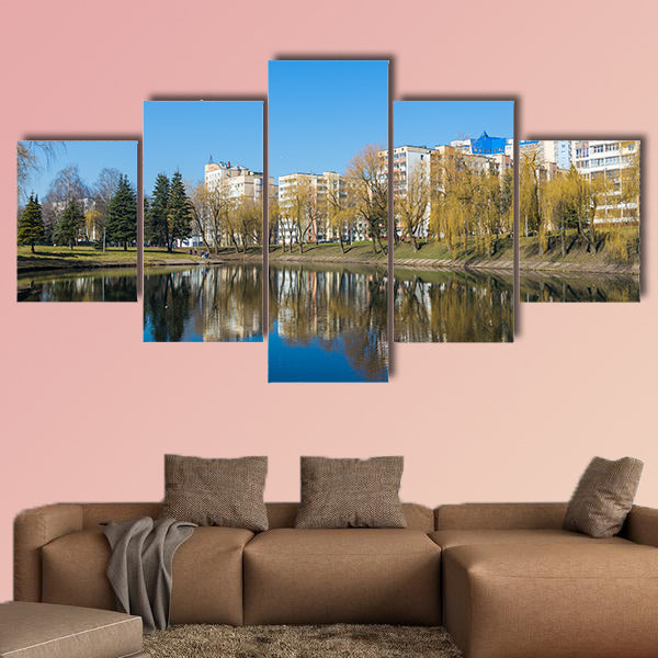 Beautiful Park in the center of the city in sunny weather in early spring multi panel canvas wall art