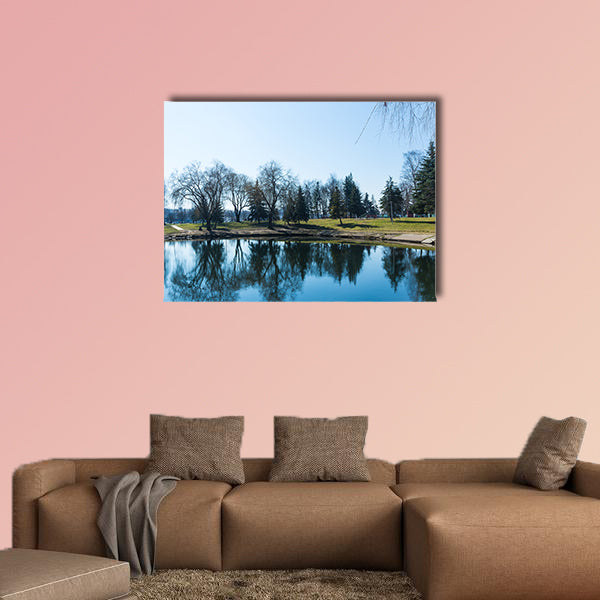 Beautiful Park in the center of the city in sunny weather in early spring wall art