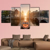 Amsterdam canal cruise ship in Amsterdam, Netherlands multi panel canvas wall art