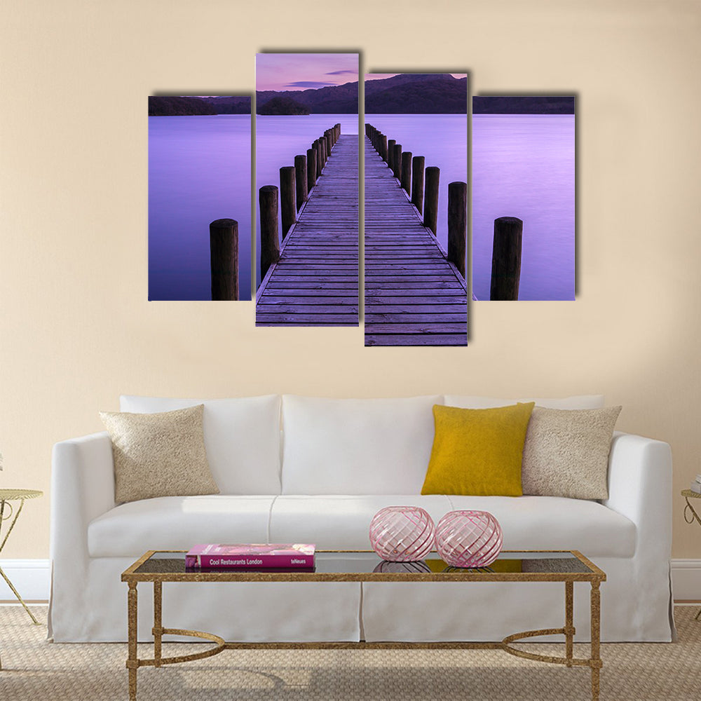 An evening view of a jetty on Coniston Water in the UK multi panel canvas wall art