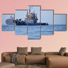 A tugboat near to container ship in the coasts of Valparaiso, Chile multi panel canvas wall art