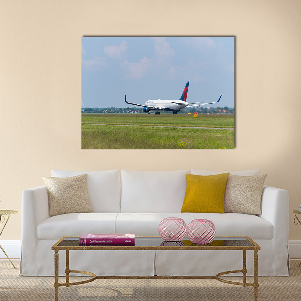 Delta airlines plane takes off at Amsterdam international airport multi panel canvas wall art