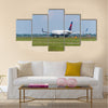 Delta airlines plane takes off at Amsterdam international airport multi panel canvas wall art