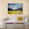 Landscape with road and snowy mountains Multi Panel Canvas Wall Art