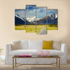 Landscape with road and snowy mountains Multi Panel Canvas Wall Art