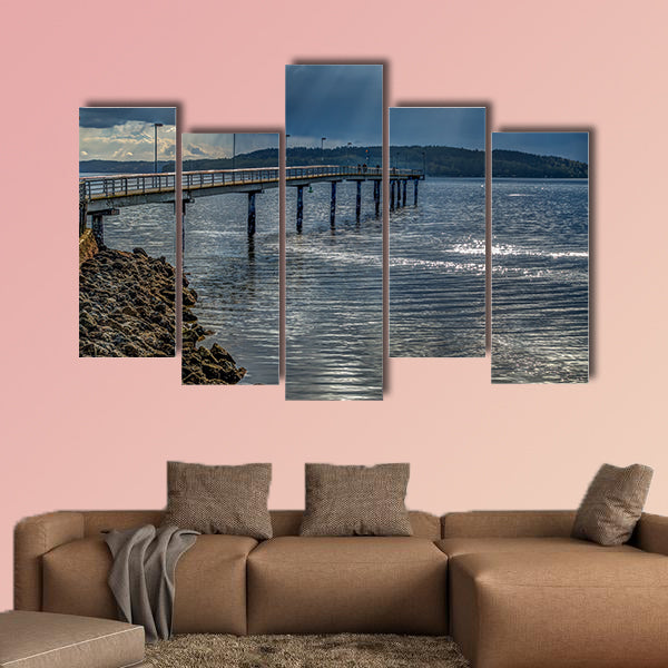 Rays of light shine through clouds in Des Moines, Washington. wall art