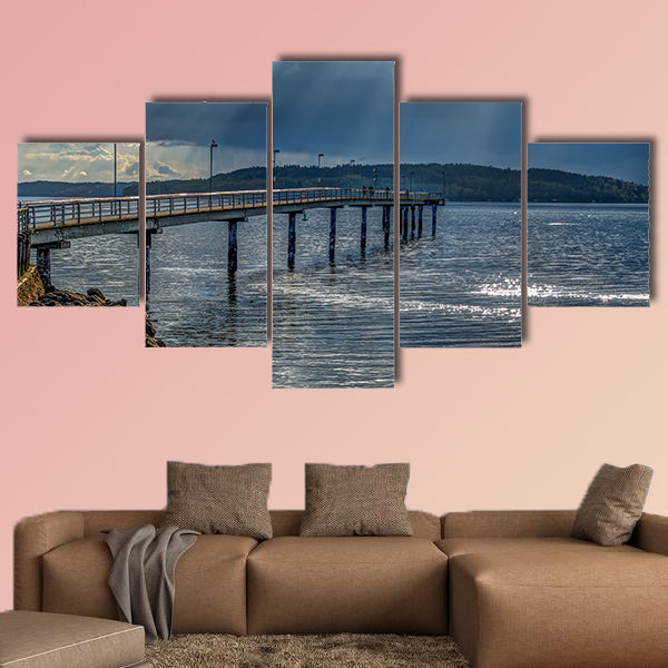 Rays of light shine through clouds in Des Moines, Washington. wall art