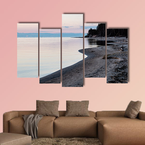 Dramatic sunrise over the calm river in spring, Daugava, Latvia