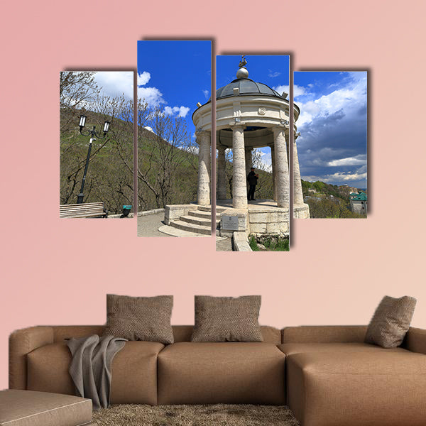 The tourist looks at the neighborhood while in the gazebo "Eolova Arfa" wall art