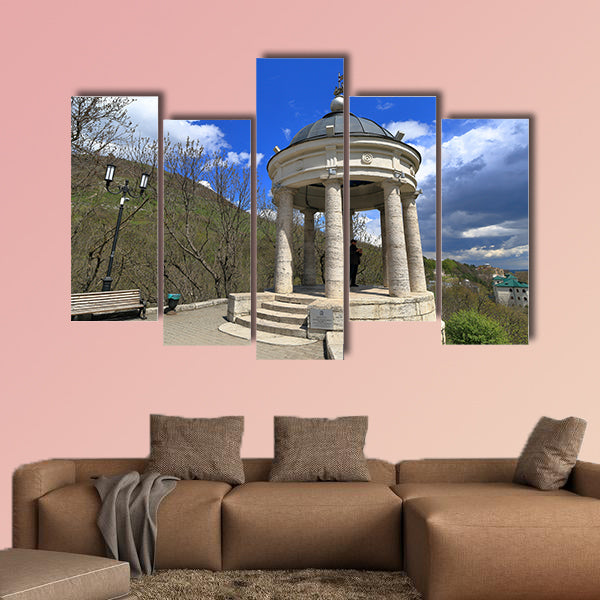 The tourist looks at the neighborhood while in the gazebo "Eolova Arfa" wall art
