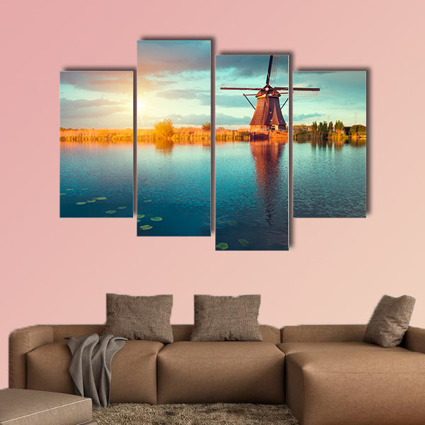 Landscape with tulips, traditional Dutch windmills and houses wall art