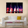 Beautiful colorful water and light show, blurry fountain multi panel canvas wall art