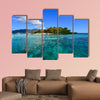 People swim in the sea at sunny day in Coron, Philippines multi panel canvas wall art